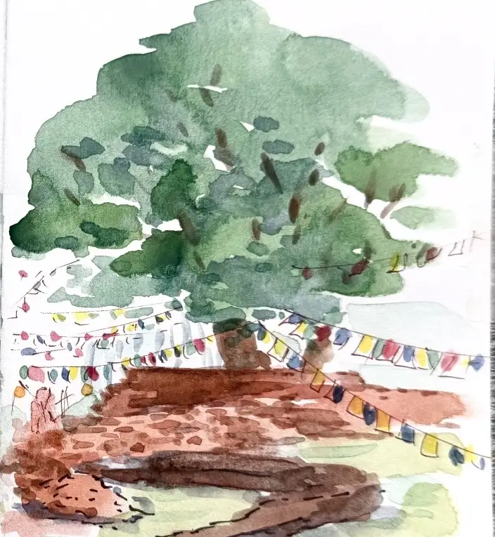 The right half: a second tree, more flags running away to the edge, and a long fallen brick wall in the grass