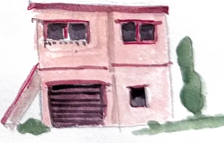 A dusty pink house with a shuttered garage and a bush at the corner
