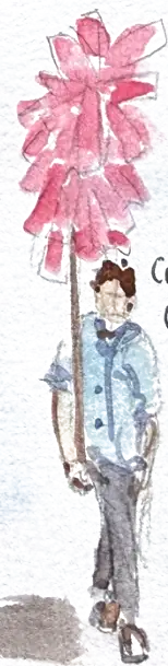 A boy carrying a pole of pink cotton candy tied in bunches, taller than he is
